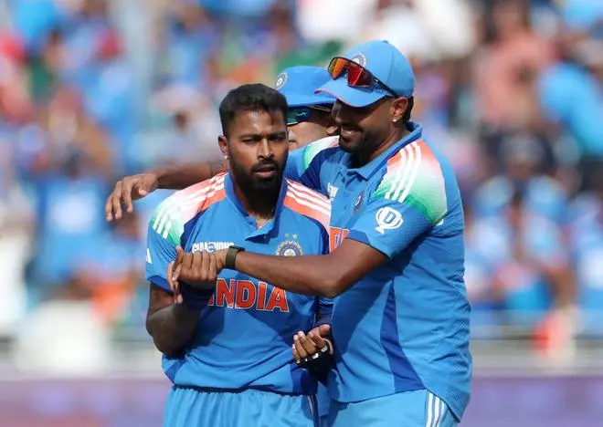 India’s Hardik Pandya celebrates after taking the wicket of Pakistan’s Saud Shakeel