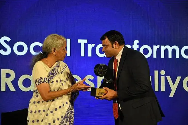 FM Sitharaman having a few words with Ramesh Raliya, while presenting the Changemaker Social Transformation Award to him at the BL Changemaker award function in New Delhi, on Friday. FM Sitharaman having a few words with Ramesh Raliya, while presenting the Changemaker Social Transformation Award to him at the BL Changemaker award function in New Delhi, on Friday.
