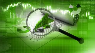 business report with magnifying glass