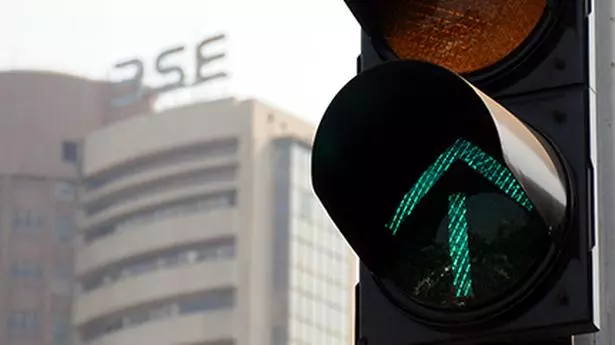 Market rises to four-month high; rupee trends lower