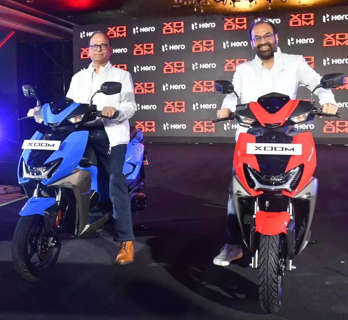 (from left) Arun Jaura, Chief Technology Officer, and Ranjivjit Singh, Chief Growth Officer, Hero Moto Corp, at the launch of Hero Xoom in Gurugram on Monday