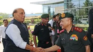 Defence Minister Rajnath Singh being welcomed by Chief of Defence Staff General Anil Chauhan as he arrives to attend the Army Commanders’ Conference, at the Manekshaw Auditorium, in New Delhi on Tuesday. Indian Army Chief General Manoj Pande is also present Defence Minister Rajnath Singh being welcomed by Chief of Defence Staff General Anil Chauhan as he arrives to attend the Army Commanders’ Conference, at the Manekshaw Auditorium, in New Delhi on Tuesday. Indian Army Chief General Manoj Pande is also present
