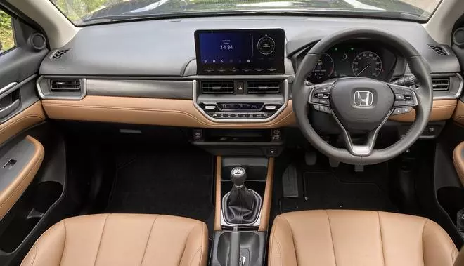 The dashboard is very appealing and the use of stitched leatherette panels, the large 10.25-inch touchscreen infotainment and faux ash wood trim inserts for the IP help elevate the cabin