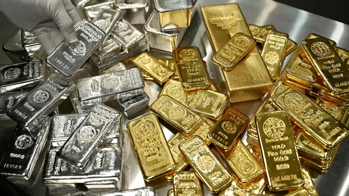 Why are gold, silver prices falling as crude spikes?