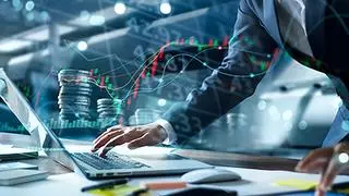 Businessman using laptop trading and analysis data on stock market investments funds and digital assets, Economy, Financial, Banking and exchange currency, Business investment and finance technology istock photo for BL