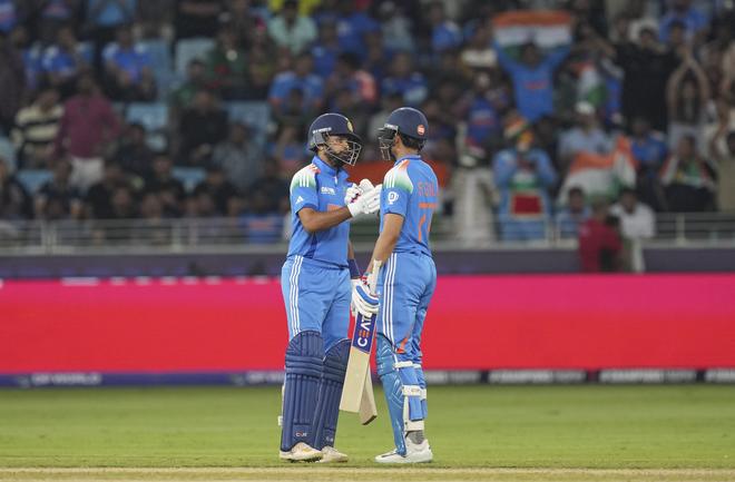 ndia’s Shubman Gill, right, celebrates his half century with Shreyas Iyer during a One Day International (ODI) cricket match of the ICC Champions Trophy between India and Bangladesh