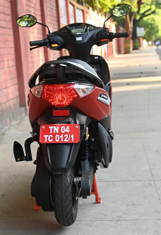 The rear tapers into a clean stop/brake lamp and indicator combination unit, that is topped by a wide, usable metal cast grab handle that is powder-coated The rear tapers into a clean stop/brake lamp and indicator combination unit, that is topped by a wide, usable metal cast grab handle that is powder-coated