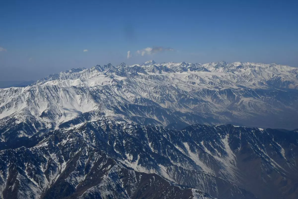 A view of  Himalayan ranges from aircraft.
Photo: Sushil Kumar Verma