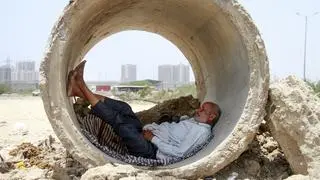 Samba: A man takes refuge inside a concrete pipe from the scorching heat on a hot summer day, in Gurugram, Thursday, May 30, 2024.  Samba: A man takes refuge inside a concrete pipe from the scorching heat on a hot summer day, in Gurugram, Thursday, May 30, 2024.