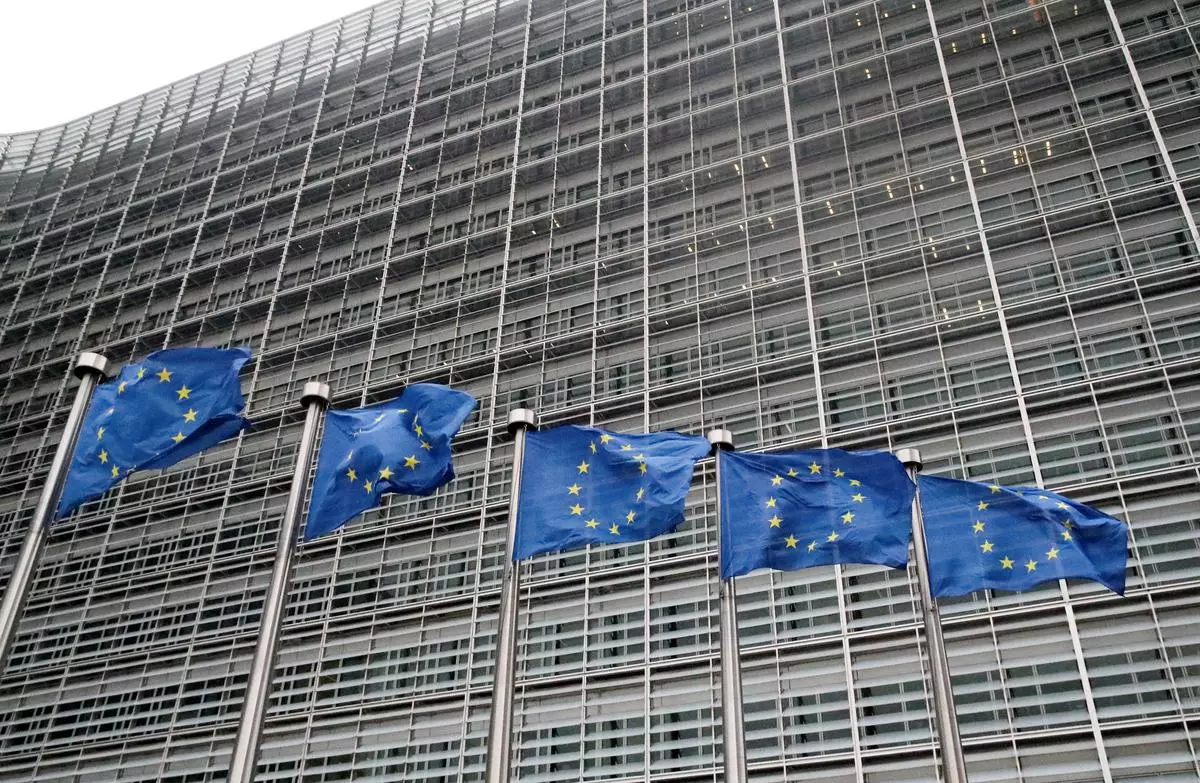 European Union flags flutter outside the EU Commission headquarters in Brussels, Belgium, 