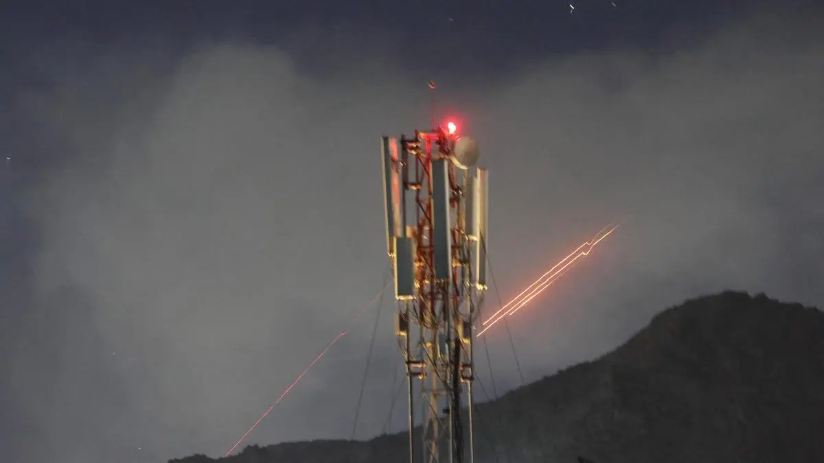 Iran hits Kuwaiti oil refinery and explosions boom over Tehran from Israeli attack