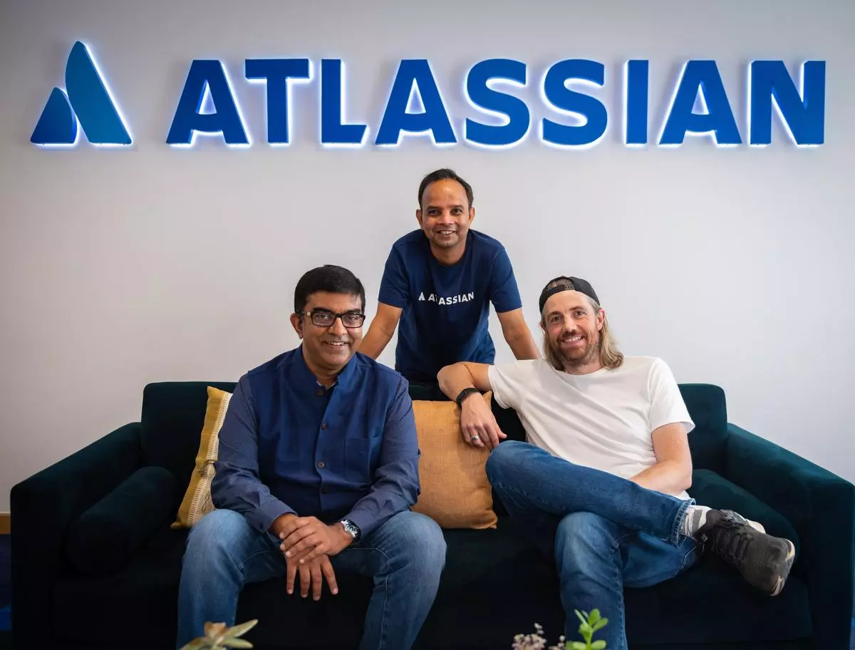(L-R) Rajeev Rajan, CTO, Atlassian, Dinesh Ajmera, Site Lead India, Atlassian and Mike Cannon-Brookes, co-founder and co-CEO, Atlassian . 