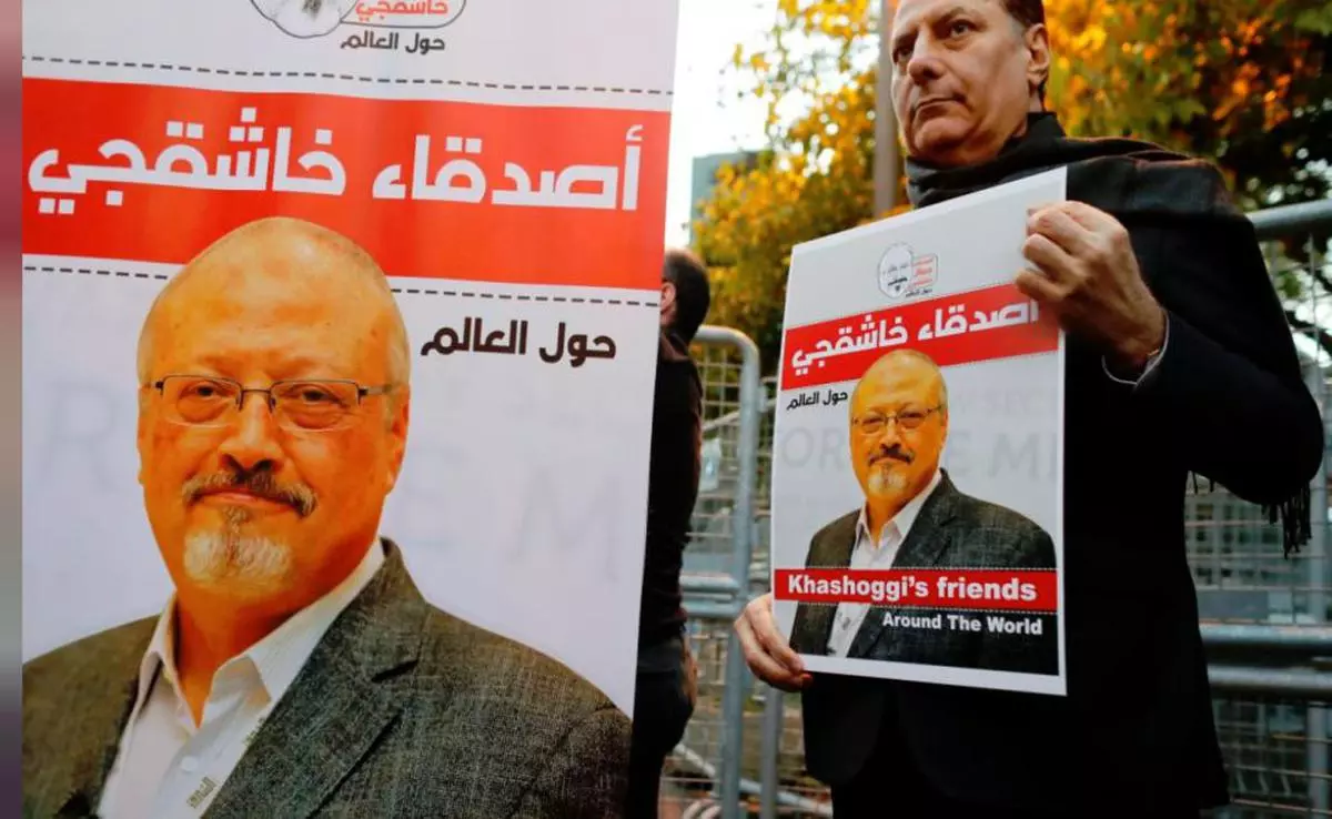 Friends of Saudi journalist Jamal Khashoggi hold posters and banners with his pictures during a demonstration outside the Saudi Arabia consulate in Istanbul, Turkey. (file photo)