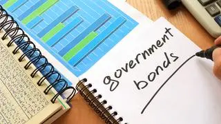 Government bonds written in a note. Trading concept. Government bonds written in a note. Trading concept.
