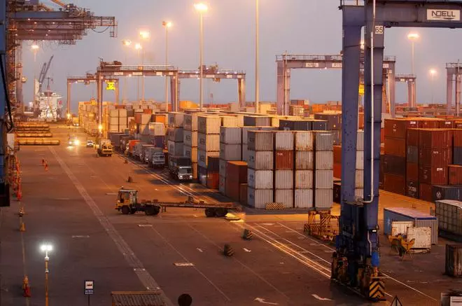 FILE PHOTO: A general view of a container terminal is seen at Mundra Port, one of the ports operated by Adani Ports and Special Economic Zones of India Ltd, in Gujarat state, western India April 1, 2014. 