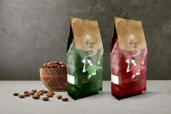 A cup of cappuccino with coffee beans around. A cup of cappuccino with coffee beans around.
