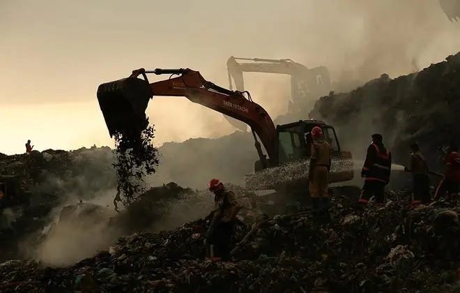 A file photo of fire force personnel trying to douse the blaze that broke out at the Brahmapuram waste treatment plant A file photo of fire force personnel trying to douse the blaze that broke out at the Brahmapuram waste treatment plant