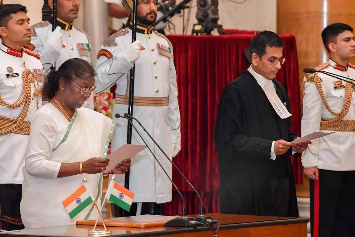 President Droupadi Murmu administers oath to Dhananjaya Y Chandrachud as the 50th Chief Justice of India, at Rashtrapati Bhawan in New Delhi, Wednesday, Nov. 9, 2022. 