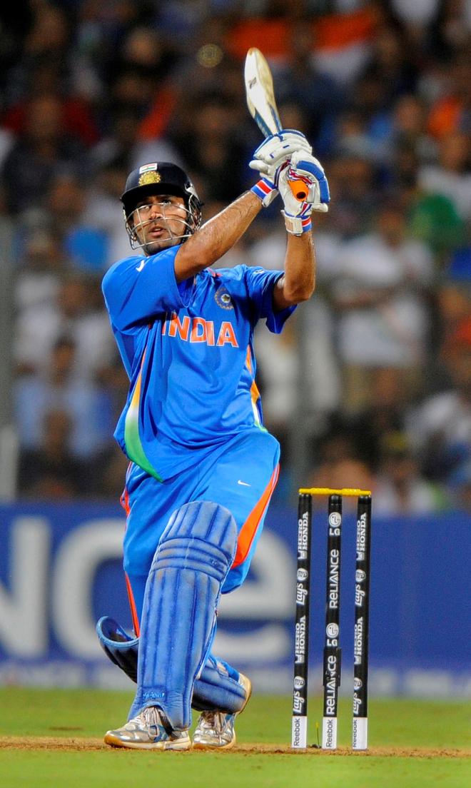 India’s M.S. Dhoni hitting the winning runs during the Cricket World Cup final 2011, match between India and Sri Lanka at The Wankhede Stadium in Mumbai on Saturday, April 02, 2011.