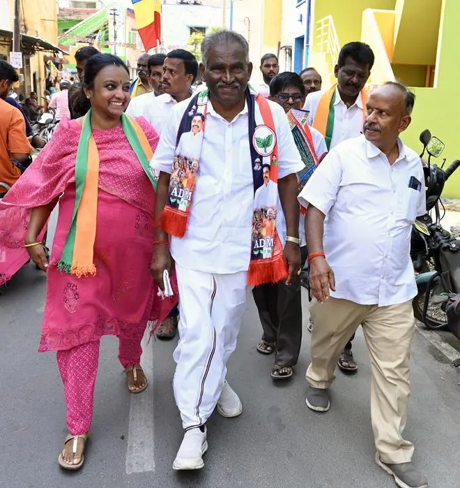 AIADMK candidate for Coimbatore South, Amman K Arjunan, engaged in a door-to-door campaign AIADMK candidate for Coimbatore South, Amman K Arjunan, engaged in a door-to-door campaign