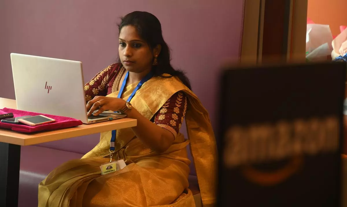 File photo: An employee seen at work at the Amazon India office in Chennai