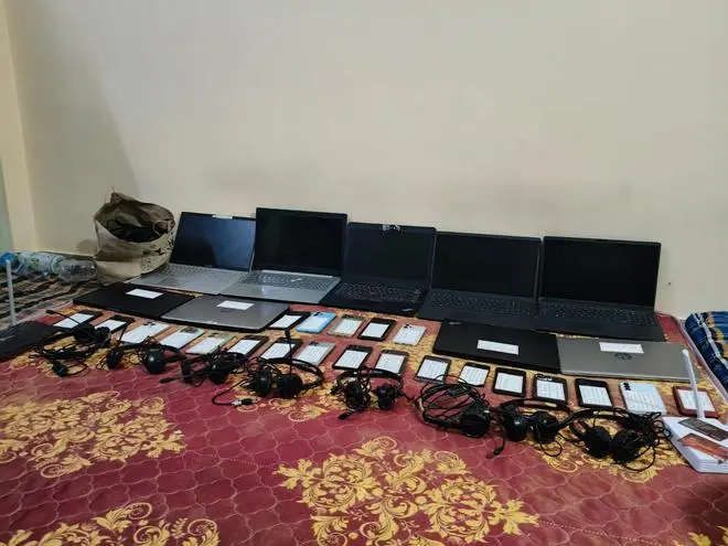 Telangana police seize phones, laptops and VoIP equipment in a raid on a villa, which housed a fake call centre, in Hyderabad on Saturday.