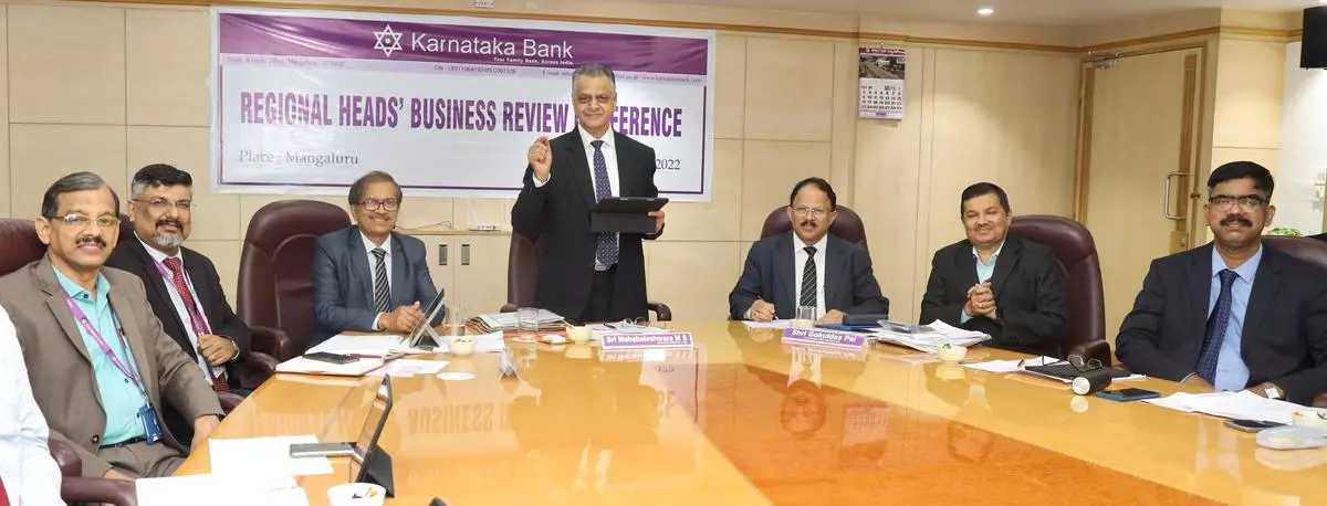 Mahabaleshwara MS, Managing Director and Chief Executive Officer of Karnataka Bank, speaks at the regional heads’ review conference in Mangaluru. 