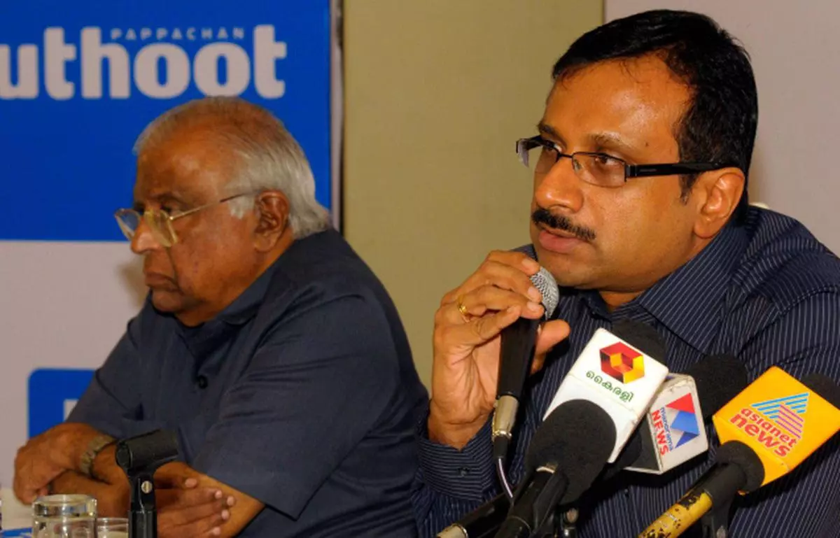 Mr Thomas George Muthoot, Managing Director, Muthoot Capital Services, and Mr Philip Thomas (left), Director, addressing a press conference in Kochi. (file photo)