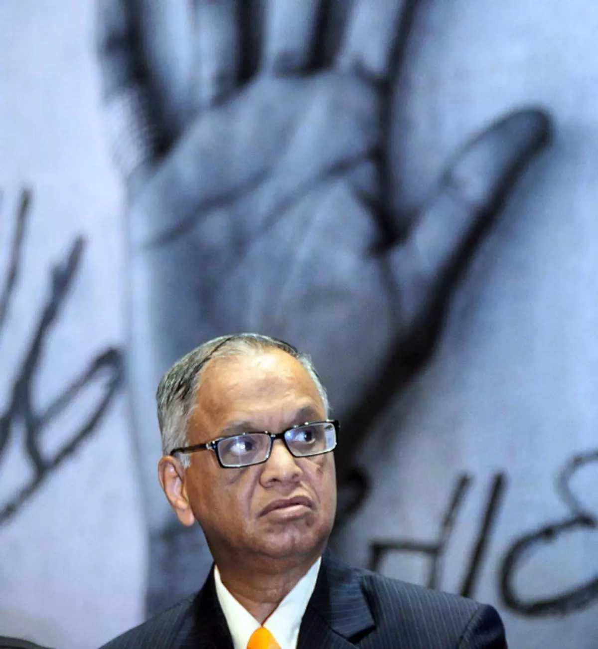 Offering solution: Infosys co-founder N. R. Narayana Murthy at the scholarship disbursement ceremony in Kolkata on Friday. — Photo: A. Roy Chowdhury