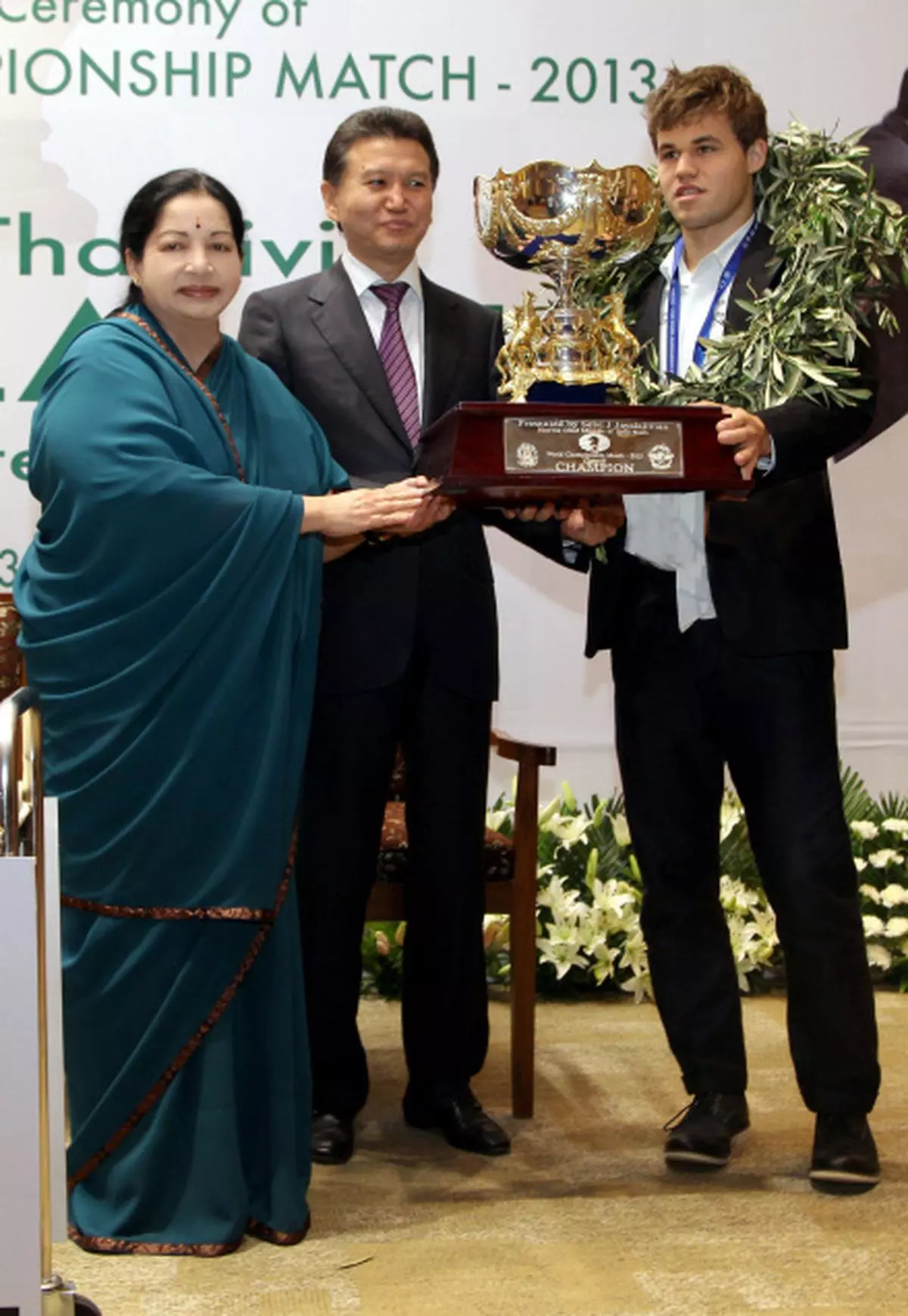 World chess champion Viswanathan Anand of India holds a trophy at an award  presentation ceremony of the FIDE World Chess Championship in Moscow,  Russia, Thursday, May 31, 2012. Anand oretained his title