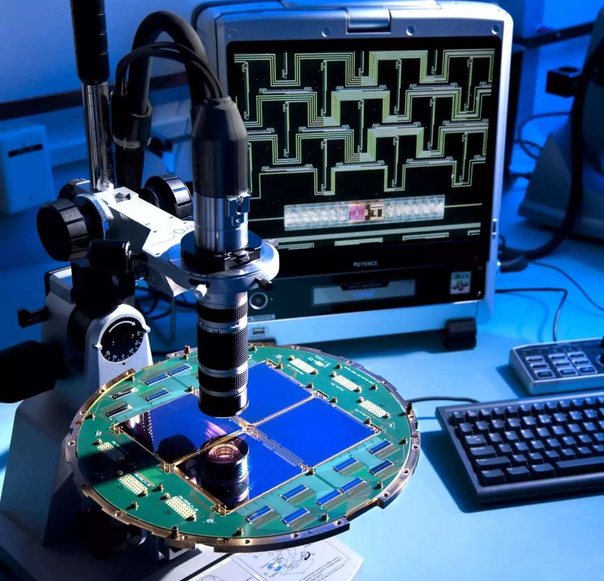 The BICEP2 telescope at the South Pole used a specialized array of superconducting detectors to capture polarized light from billions of years ago. The detector array is shown here, under a microscope. Techniques called micro-lithography and micro-machining are used to fabricate the devices. (Image Credit: NASA/JPL-Caltech)