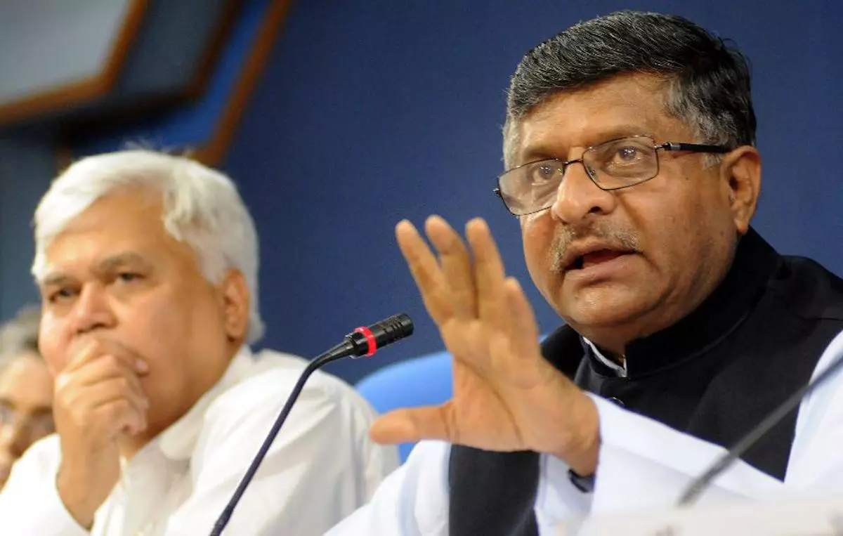 Union Minister for Communication &amp; IT and Law, Ravi Shankar Prasad, addressing a press conference along with R S Sharma, Secretary, Department of Electronics and Information Technology, in New Delhi on Saturday. Photo: Kamal Narang