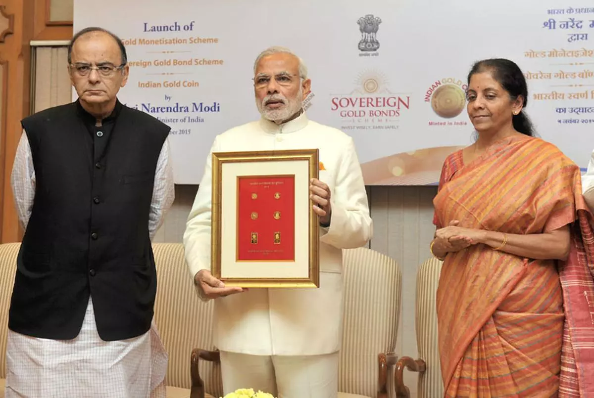 The Prime Minister, Shri Narendra Modi launches the Gold schemes, in New Delhi on November 05, 2015.The Union Minister for Finance, Corporate Affairs and Information & Broadcasting, Shri Arun Jaitley and Minister of State for Commerce & Industry (Independent Charge), Smt. Nirmala Sitharaman are also seen.
