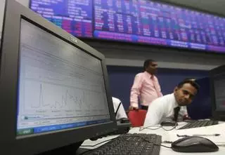 Asian shares face weekly losses