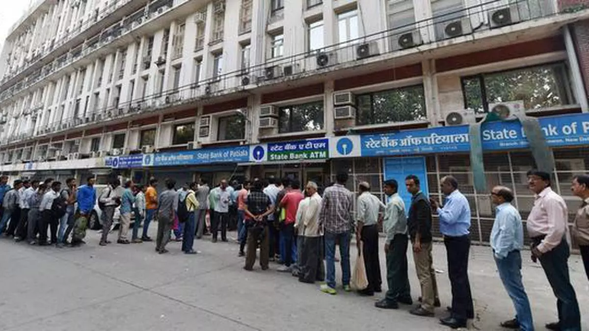 Demonetisation: Queues get longer at banks, ATMs - The Hindu
