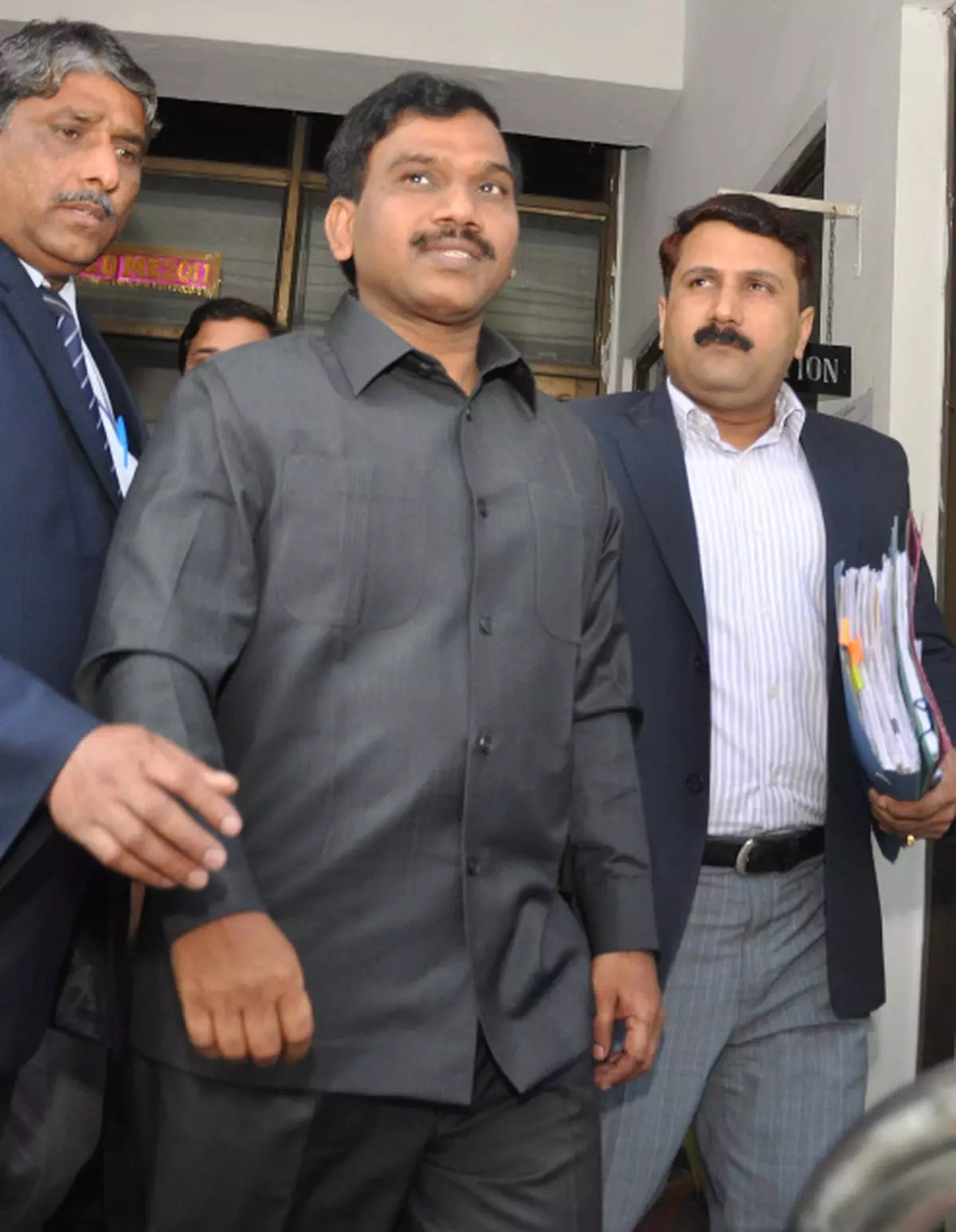 The former Telecom Minister, Mr A. Raja, being taken for interrogation by CBI sleuths. (file photo)