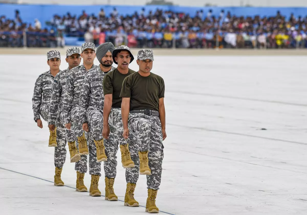 Air Force personnel, wearing a new pattern of combat uniform, perform a march-past during 90th anniversary celebrations of Indian Air Force (IAF), at the Air Force Station in Chandigarh, Saturday, October 8, 2022. (PTI)