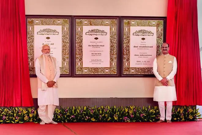 Prime Minister Narendra Modi with Lok Sabha Speaker Om Birla during the inauguration of the new Parliament building, in New Delhi, Sunday, May 28, 2023. (PTI Photo) Prime Minister Narendra Modi with Lok Sabha Speaker Om Birla during the inauguration of the new Parliament building, in New Delhi, Sunday, May 28, 2023. (PTI Photo)