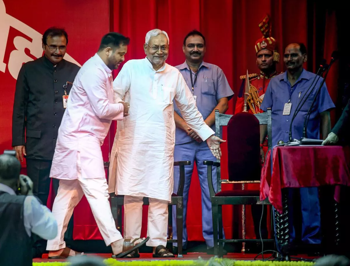 Bihar Chief Minister Nitish Kumar with his deputy Tejashwi Yadav during their swearing-in ceremony at the Raj Bhavan, in Patna, Wednesday, August 10, 2022. (PTI)