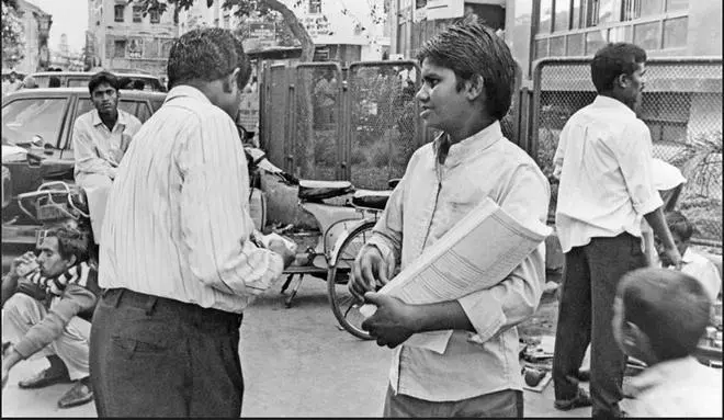 Boys selling share transfers in Dalal Street in what was then Bombay in 1995 