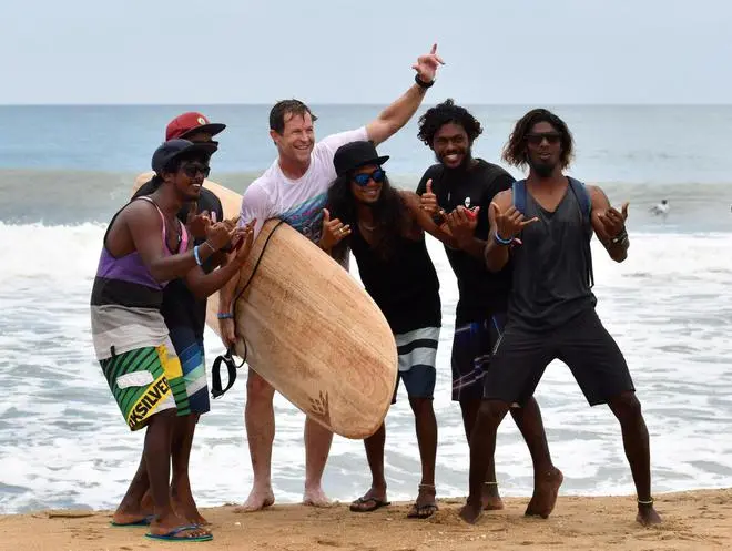 Former South African cricketer Jonty Rhodes takes photo with surfing enthusiasts at the Covelong Festival on August 25, 2019. (B Velankanni Raj) Former South African cricketer Jonty Rhodes takes photo with surfing enthusiasts at the Covelong Festival on August 25, 2019. (B Velankanni Raj)