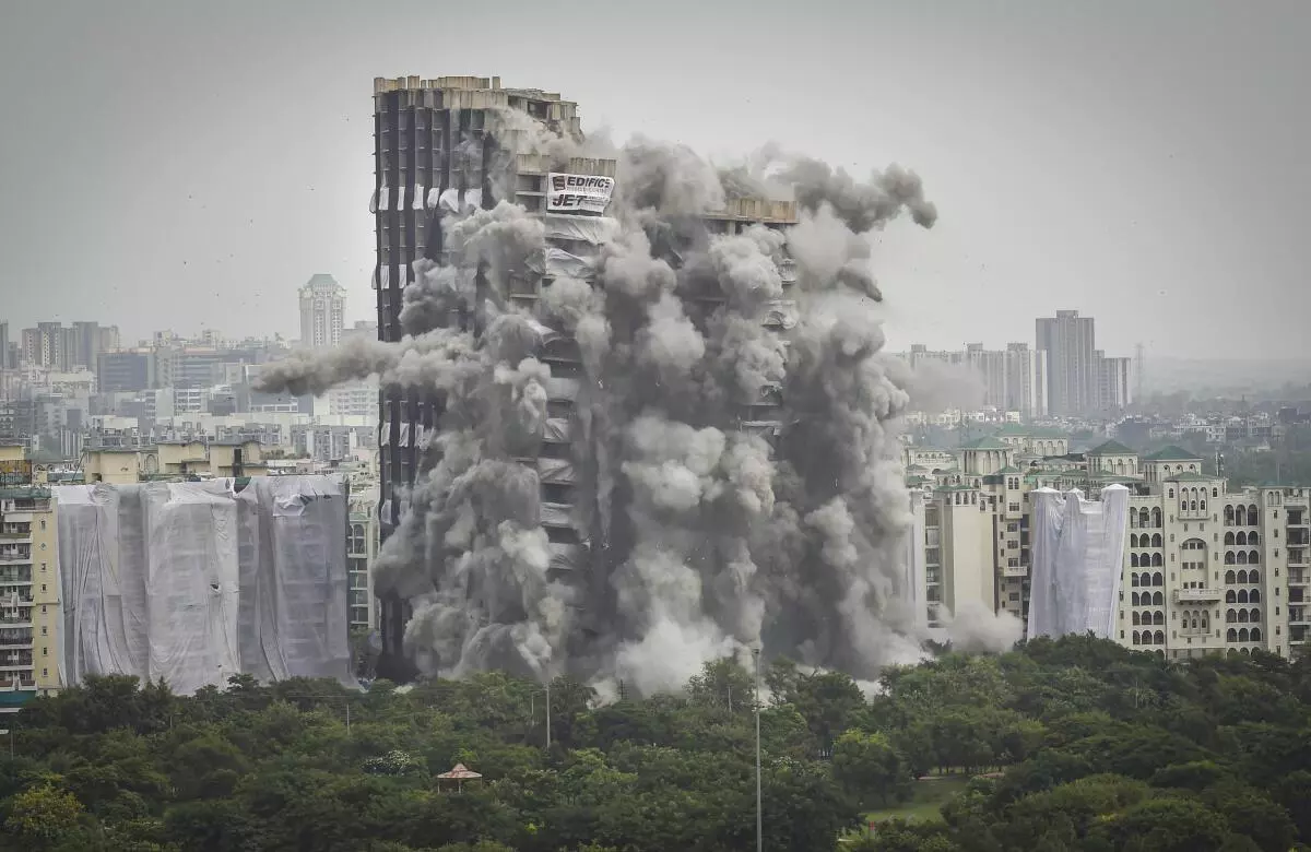 Demolition of Supertech’s twin towers in Noida on Sunday, August 28, 2022. (PTI)