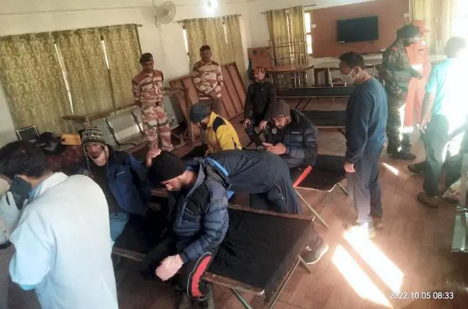 The first group of trainees, who were trapped in an avalanche in Draupadi’s Danda-2 mountain peak on Tuesday, take rest after their evacuation, at ITBP Matli Hospital in Uttarkashi district. (PTI) The first group of trainees, who were trapped in an avalanche in Draupadi’s Danda-2 mountain peak on Tuesday, take rest after their evacuation, at ITBP Matli Hospital in Uttarkashi district. (PTI)