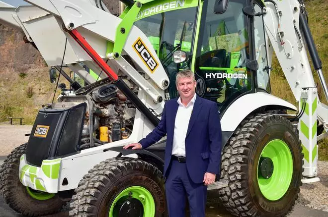 JCB Chief Innovation and Growth Officer Tim Burnhope with hydrogen-powered machinery 