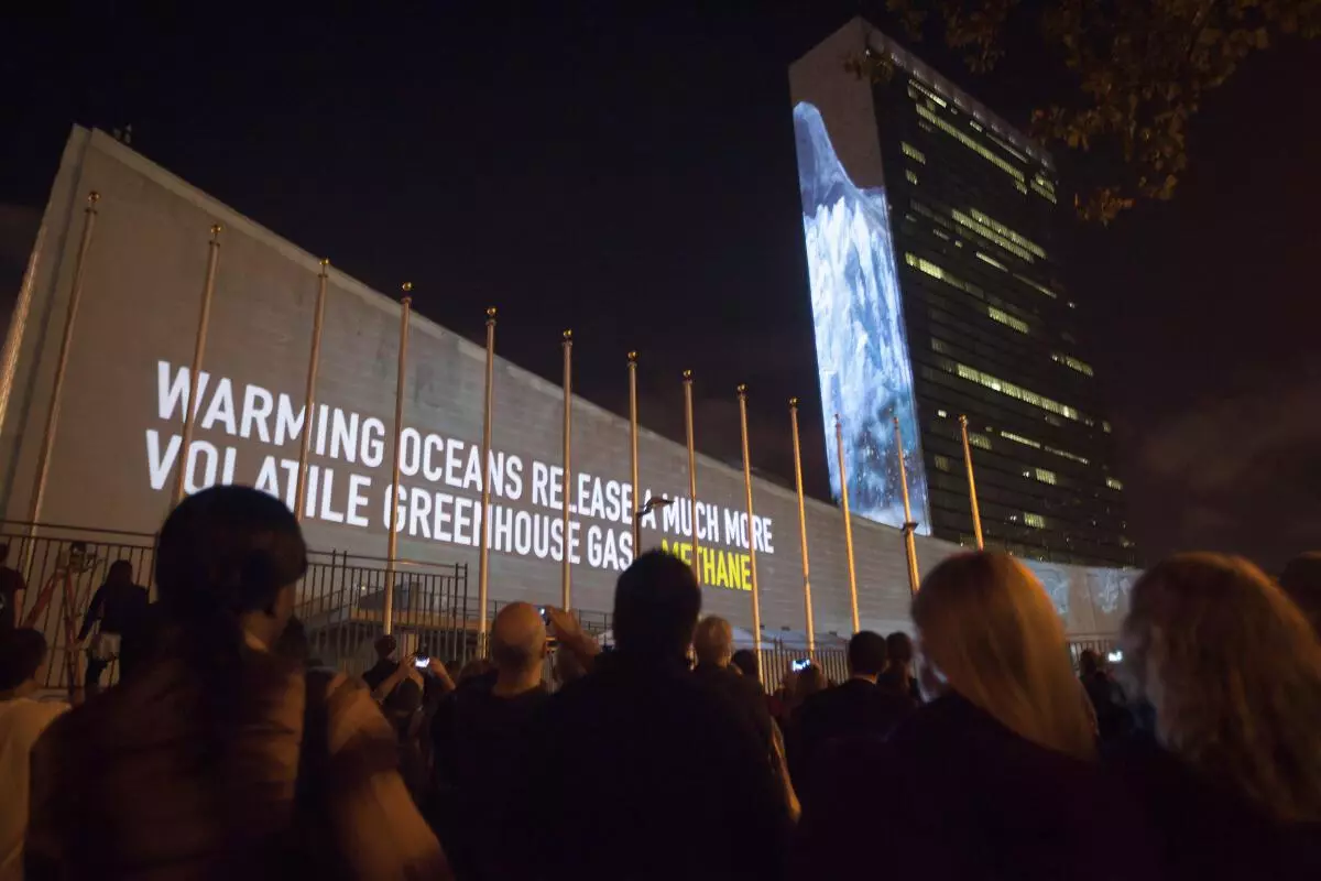 Messages on methane gas and carbon dioxide emissions are projected onto the United Nations building ahead of the climate change talks that will take place on the sidelines of the UN General Assembly, in New York. REUTERS/File Photo