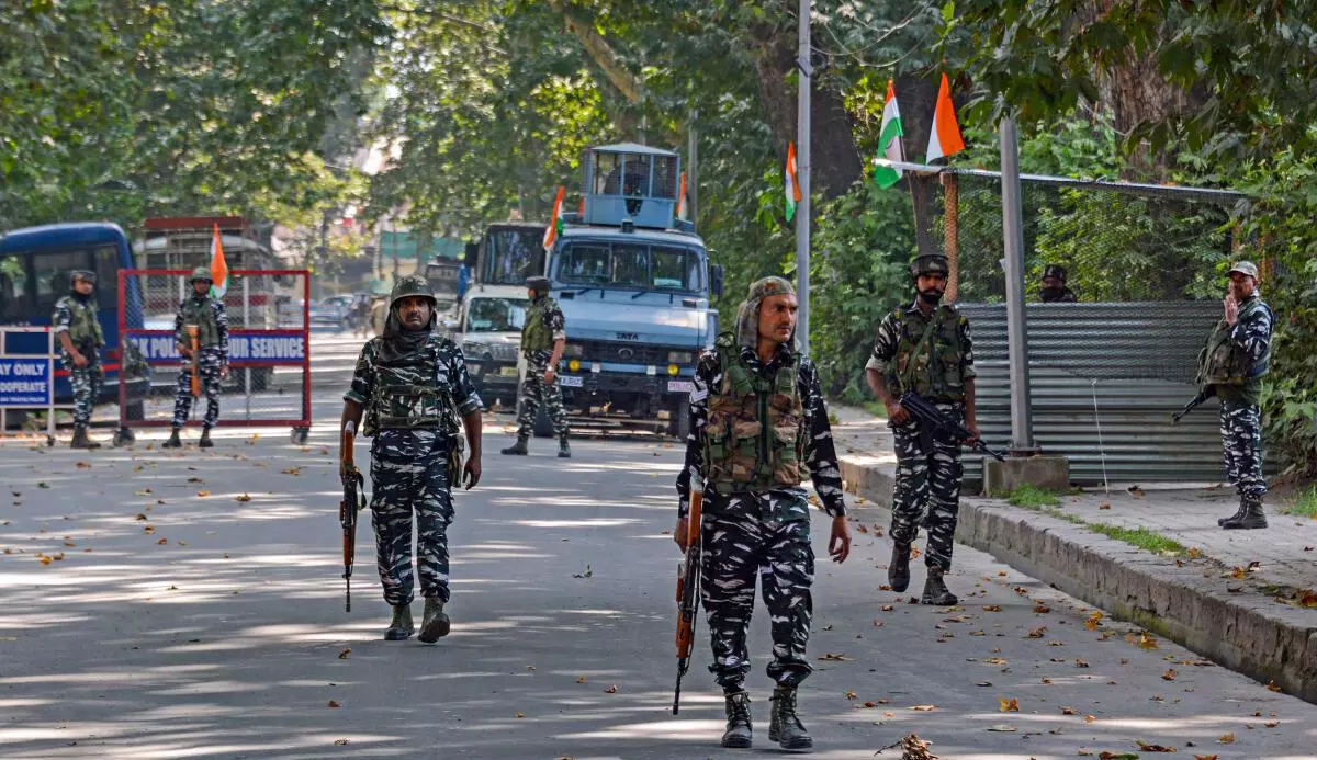 Security personnel patrol outside Sher-e-Kashmir Cricket Stadium, during full dress rehearsal for Independence Day celebrations, in Srinagar, Saturday, August 13, 2022. (PTI)