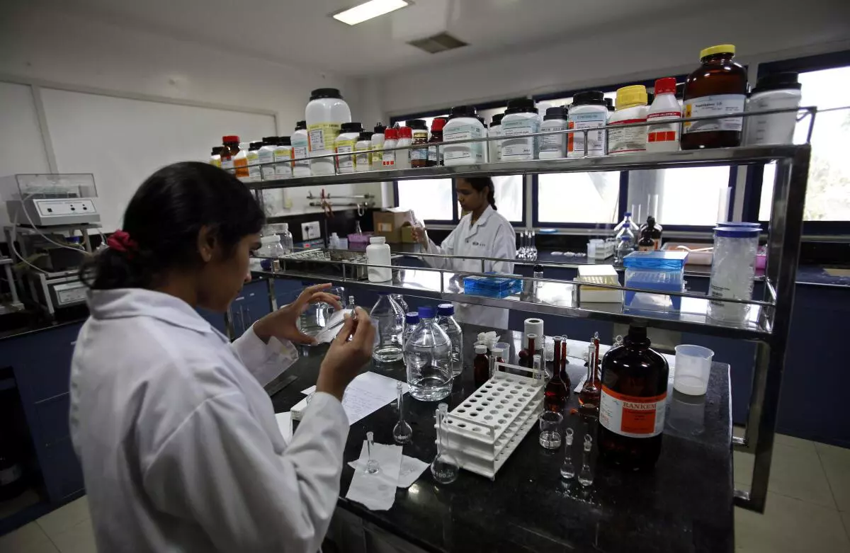 Indian scientists work inside a laboratory of the Research and Development Centre of Natco Pharma Ltd (File photo/AP) 