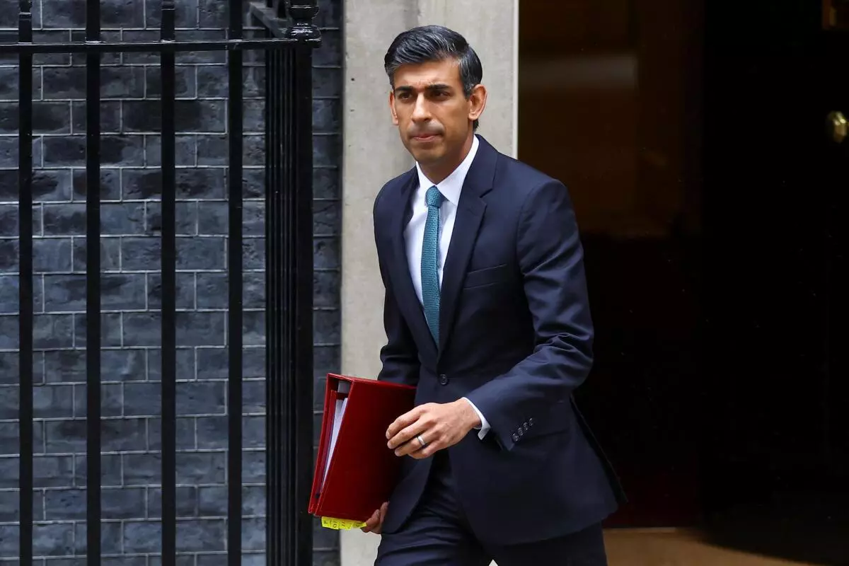 Britain’s Prime Minister Rishi Sunak walks outside Number 10 Downing Street, in London, Britain, October 26, 2022. REUTERS