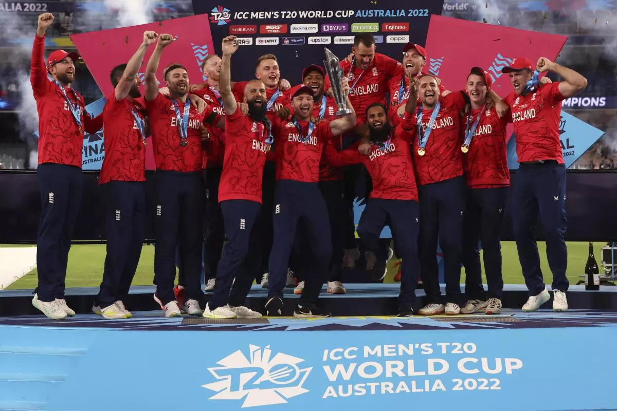 England players celebrate with their trophy after defeating Pakistan in the final of the T20 World Cup Cricket tournament at the Melbourne Cricket Ground in Melbourne, Australia, Sunday, November 13, 2022. (AP Photo)