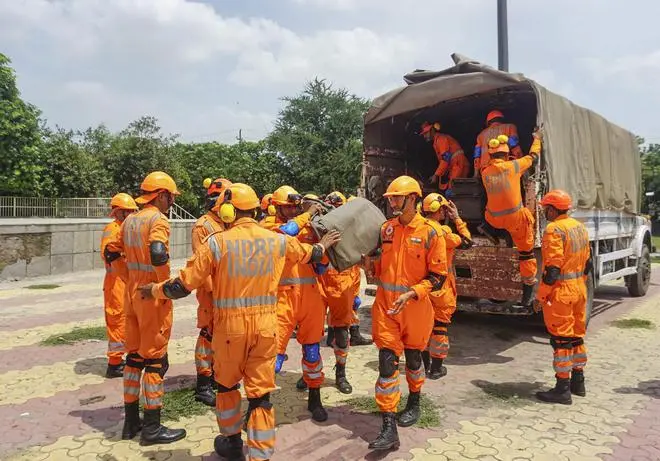 National Disaster Response Force (NDRF) personnel deployed ahead of the demolition of Supertech twin towers in Noida, Sunday, August 28, 2022. (PTI) National Disaster Response Force (NDRF) personnel deployed ahead of the demolition of Supertech twin towers in Noida, Sunday, August 28, 2022. (PTI)